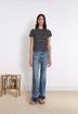 JEANS FLARE BAJO PATCH