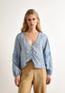 BLUSA DETALLES MANGA ABULLONADA