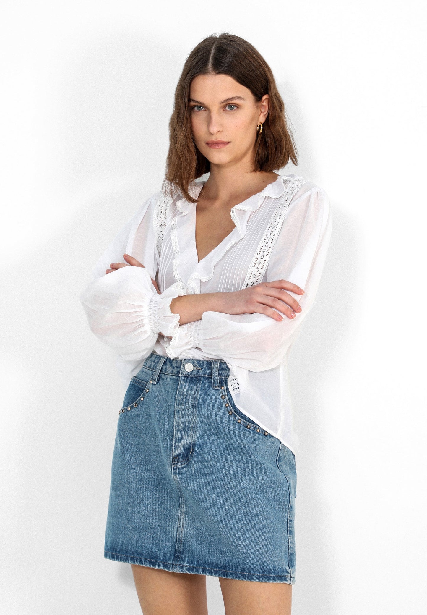 FALDA MINI TACHUELAS