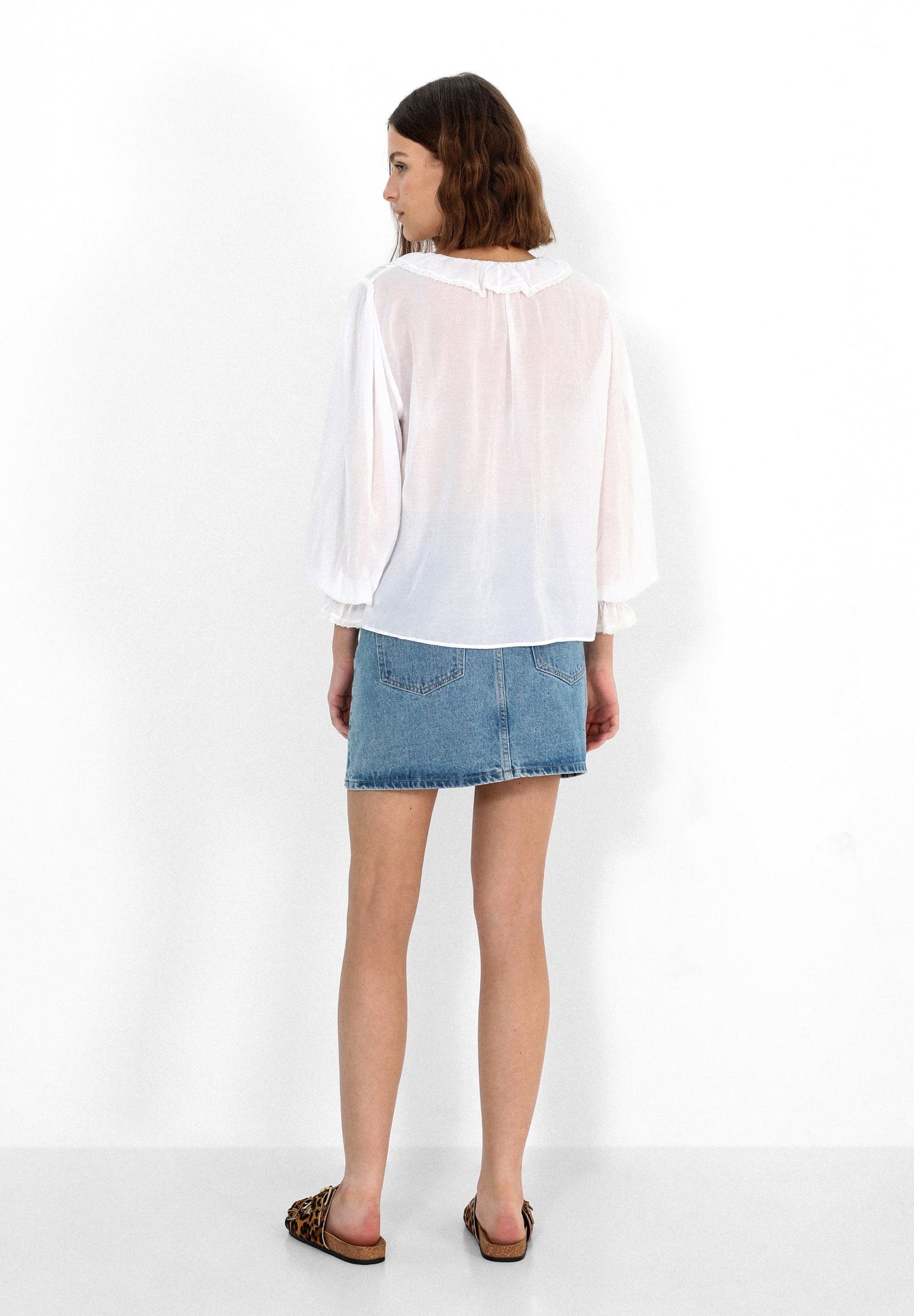 FALDA MINI TACHUELAS