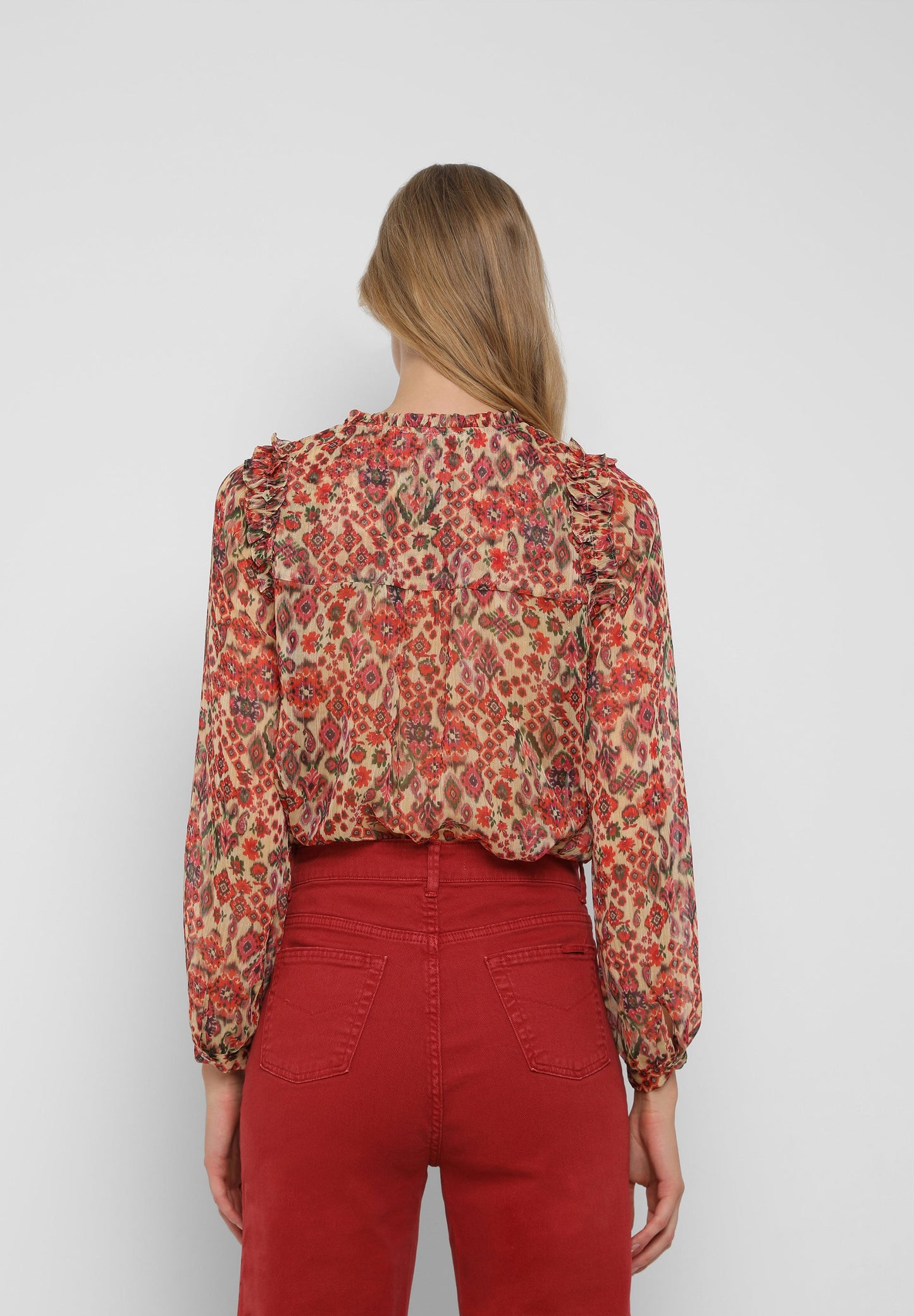 BLUSA ESTAMPADA VOLANTES