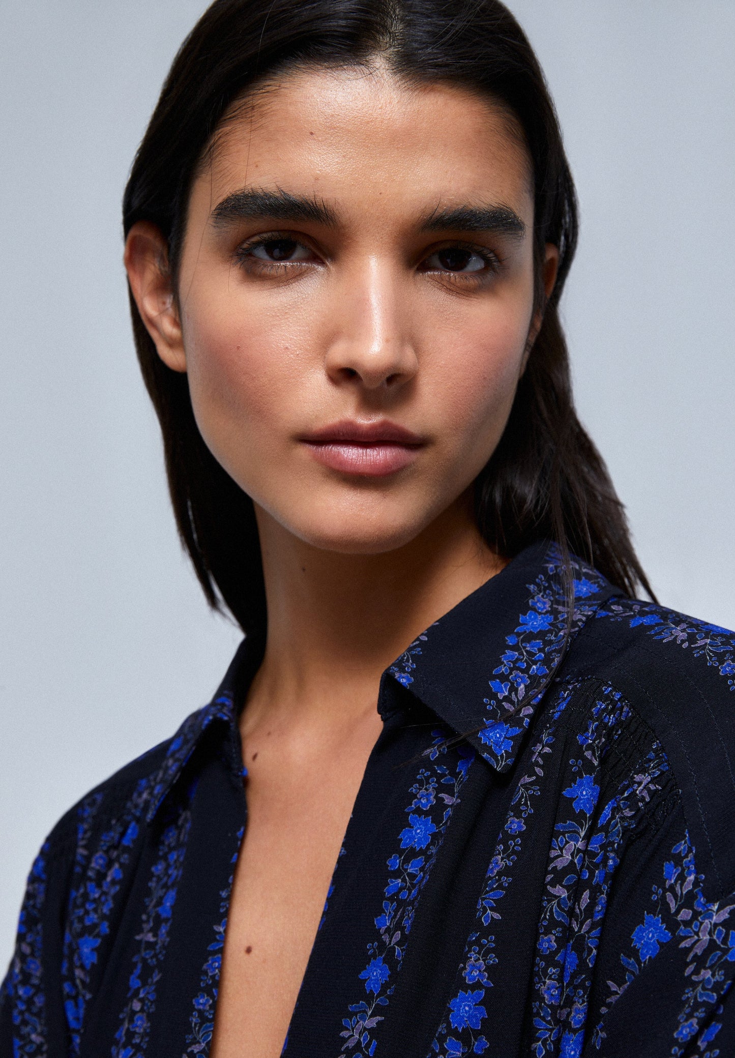 BLUSA RAYAS FLORES