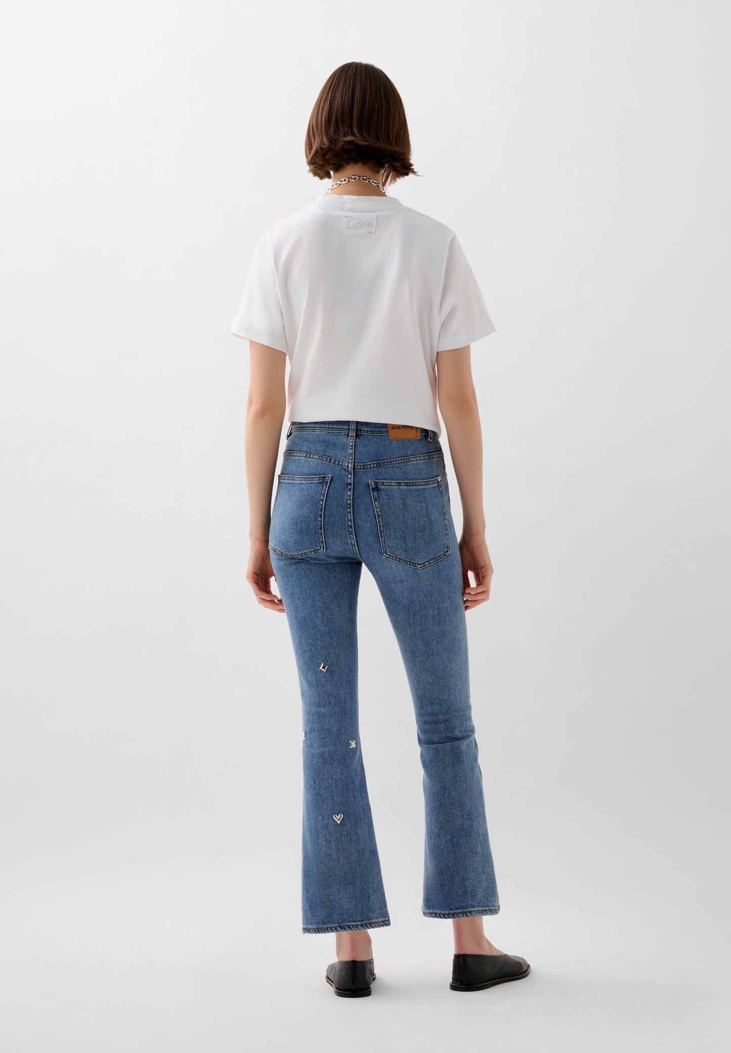 PANTALÓN VAQUERO TACHUELAS