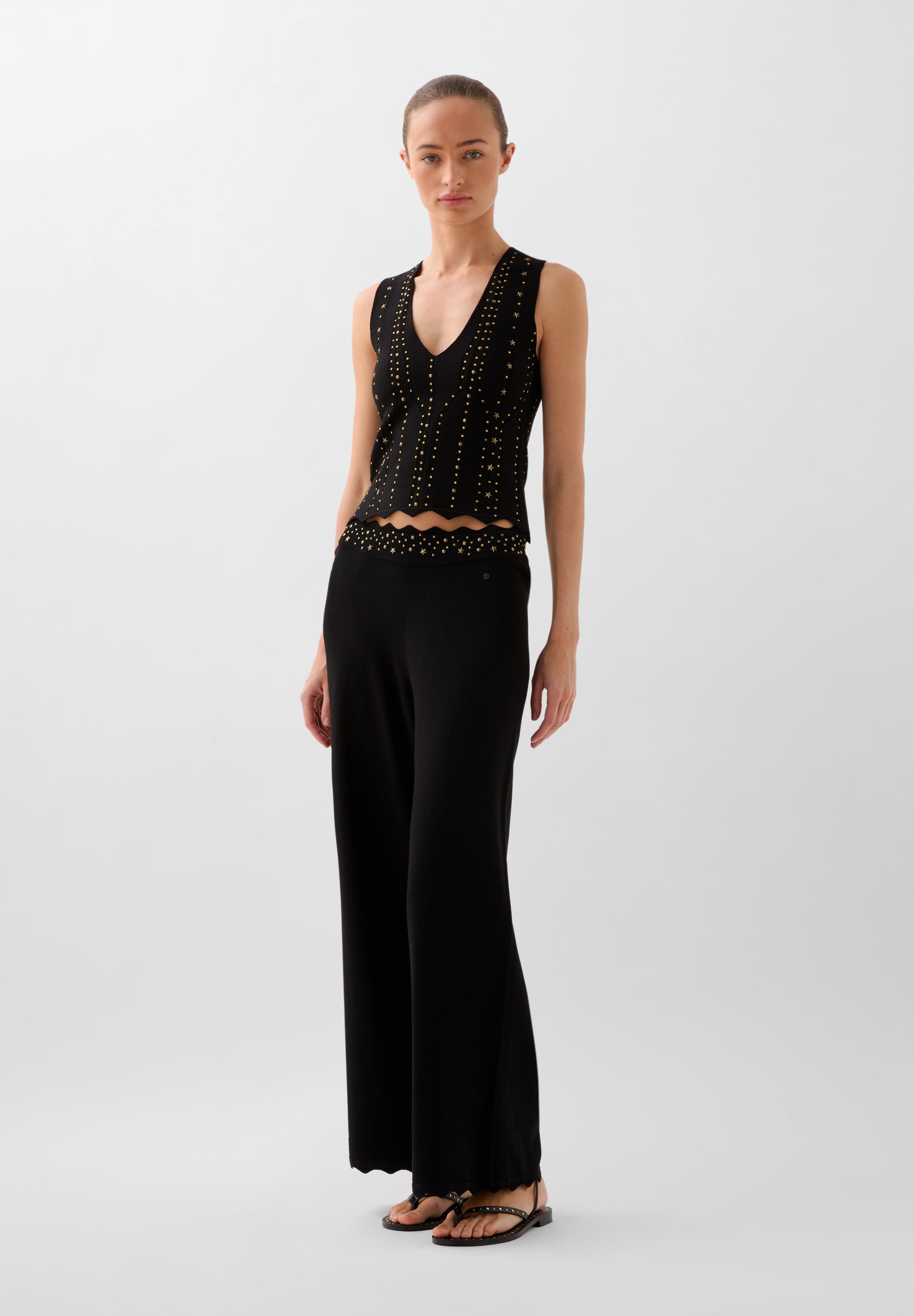 PANTALÓN PUNTO TACHUELAS