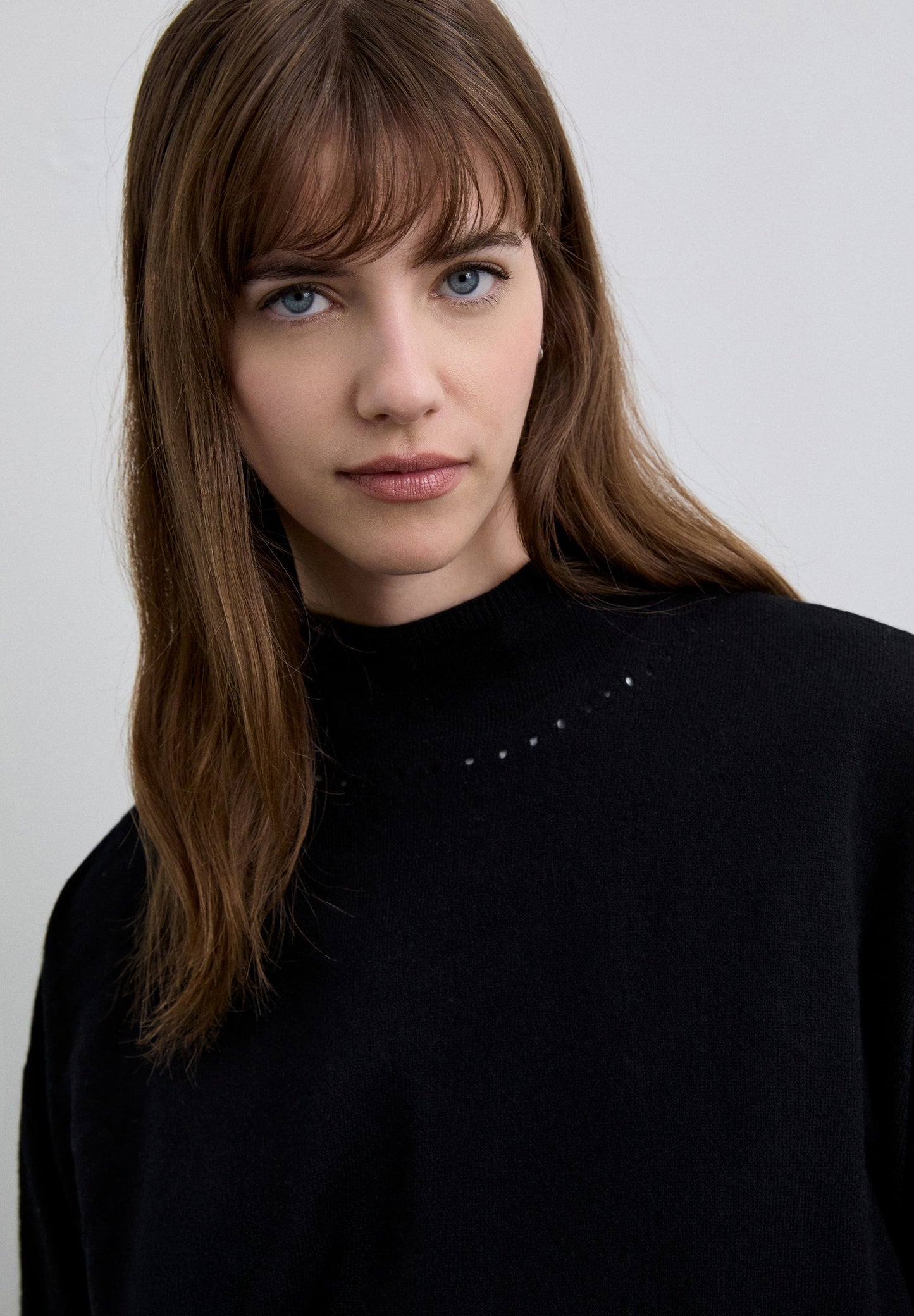 JERSEY CUELLO ALTO MEZCLA LANA