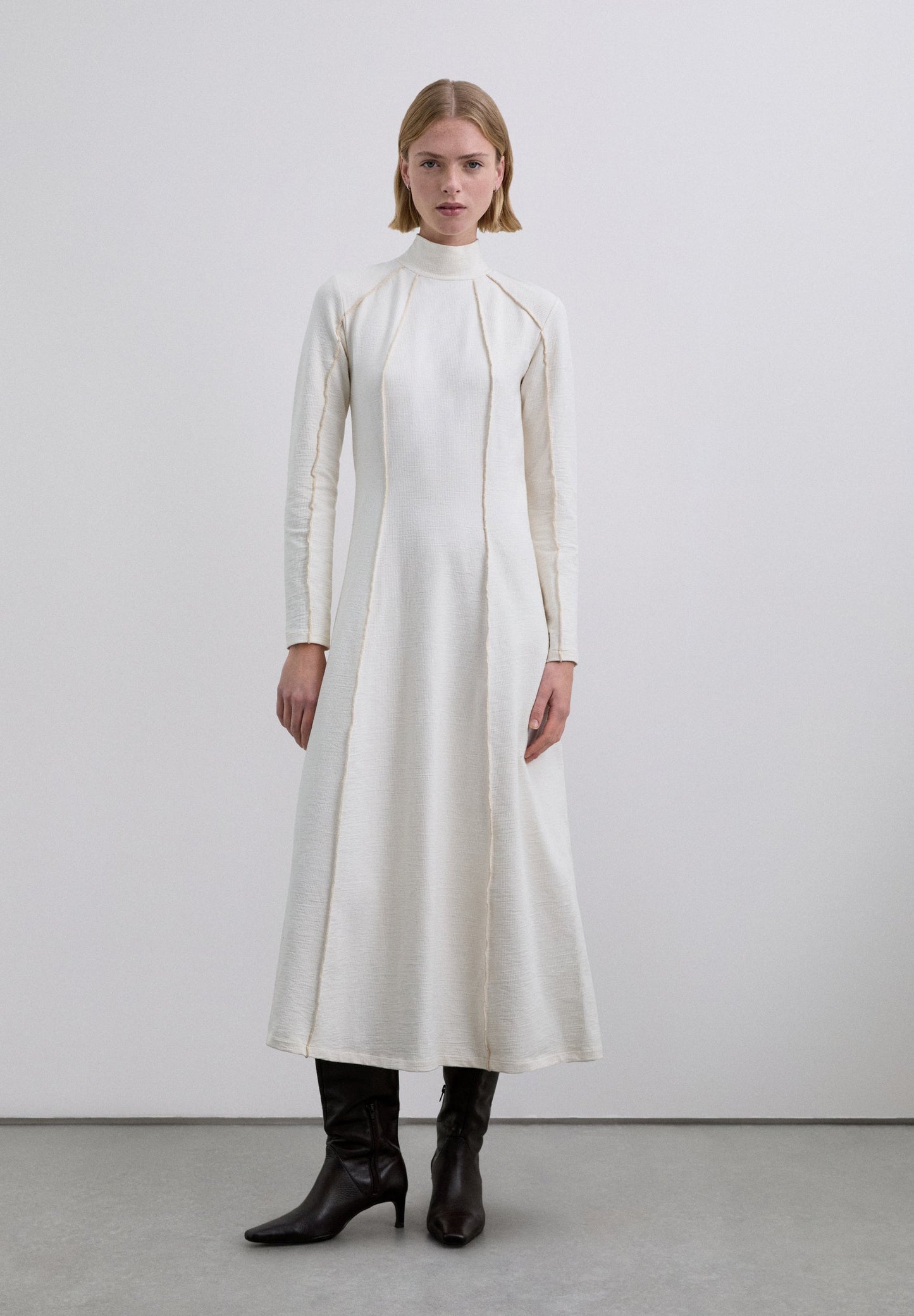 VESTIDO MIDI PUNTO OVERLOCK