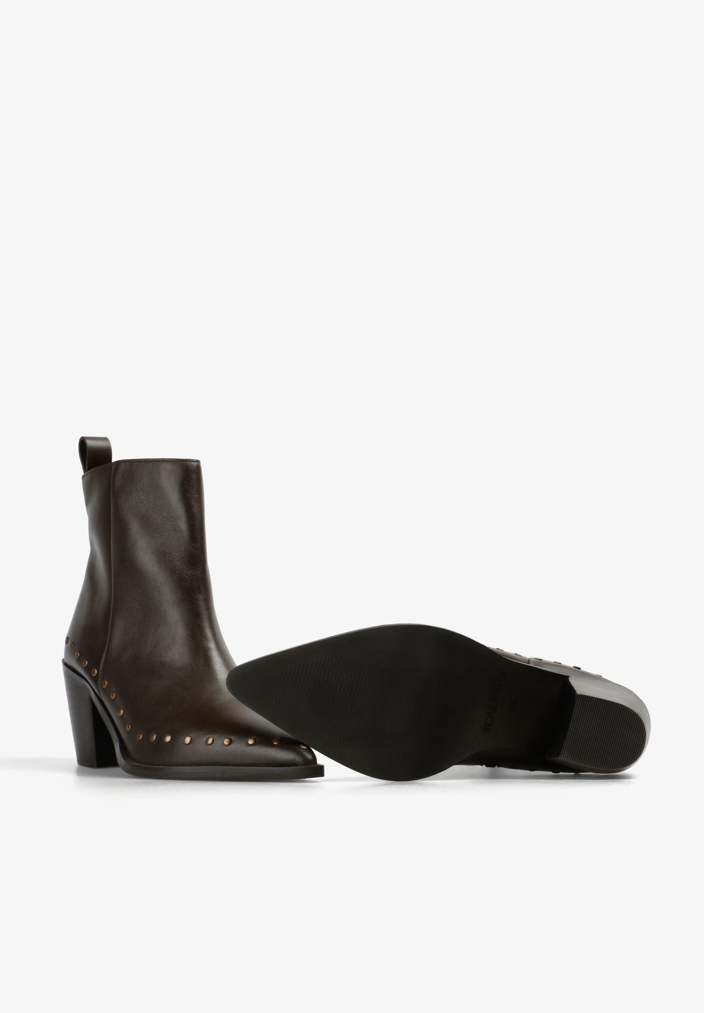 BOTAS DE PIEL CON TACHAS