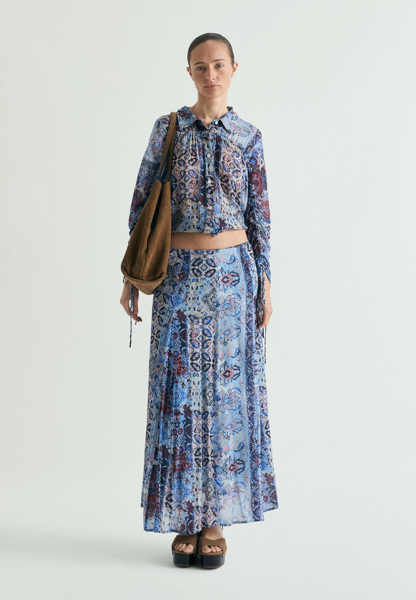 BLUSA FLUIDA ESTAMPADA